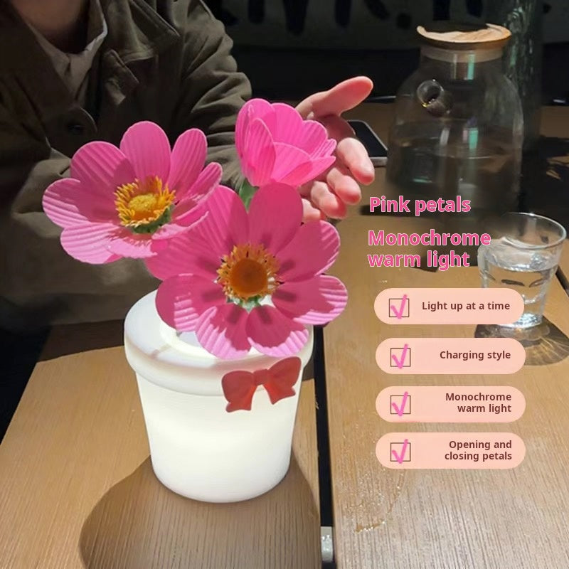 A warm night light that can automatically open and close flowers
