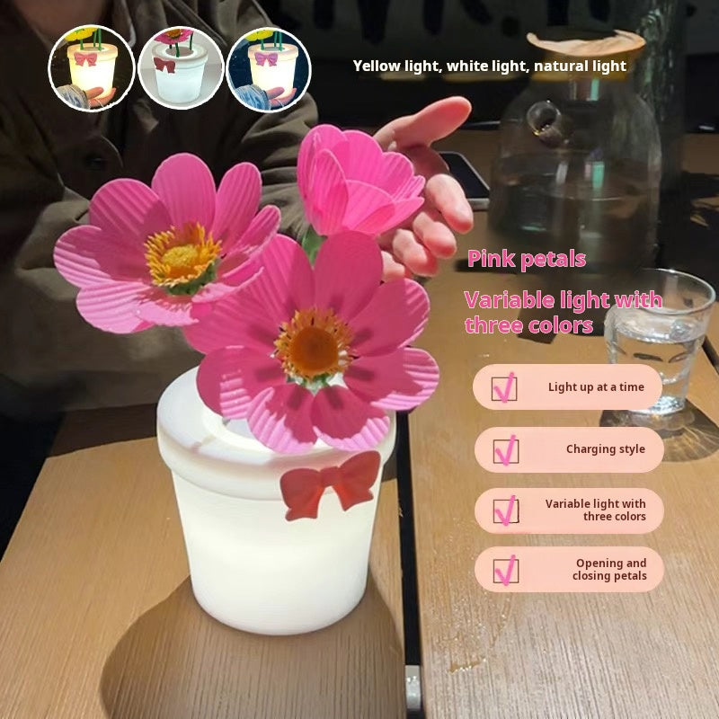 A warm night light that can automatically open and close flowers